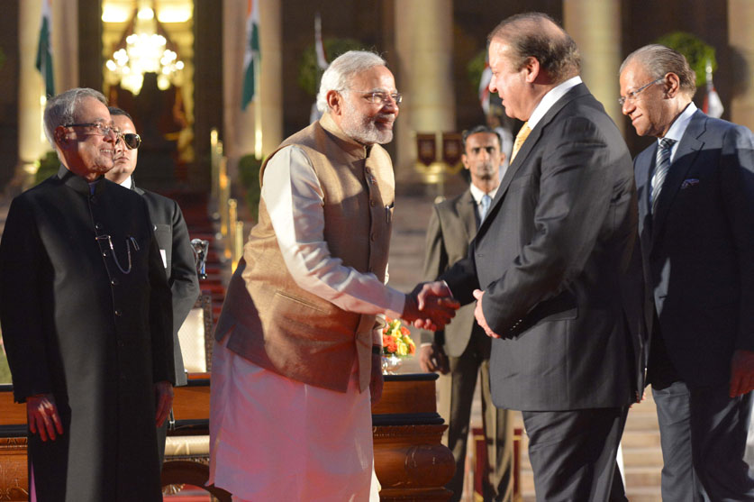Prime Minister Narendra Modi being greeted by Prime Minister of Pakistan Nawaz Sharif after the swearing-in ceremony at Rashtrapati Bhavan, in New Delhi on May 26, 2014