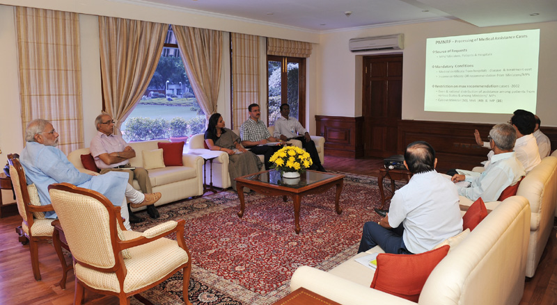 The Prime Minister, Shri Narendra Modi chairing a meeting to review the functioning of the Prime Minister's National Relief Fund, in New Delhi on July 19, 2014
