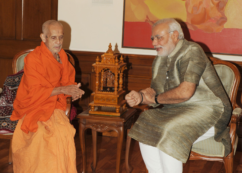 HH Sri Vishvesha Tirtha Swamiji of Pejawar Mutt calls on the Prime Minister, Shri Narendra Modi, in New Delhi on July 22, 2014