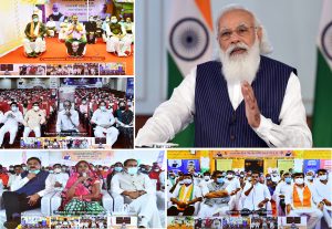 PM interacts with the beneficiaries of Pradhan Mantri Garib Kalyan Anna Yojana (PMGKAY) in Madhya Pradesh