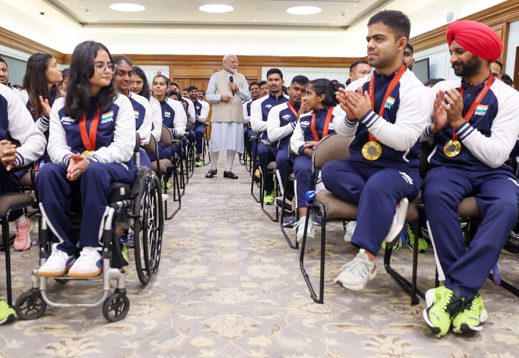 PM interacting with the Indian Contingent of the Paris Paralympic 2024, in New Delhi on September 12, 2024.